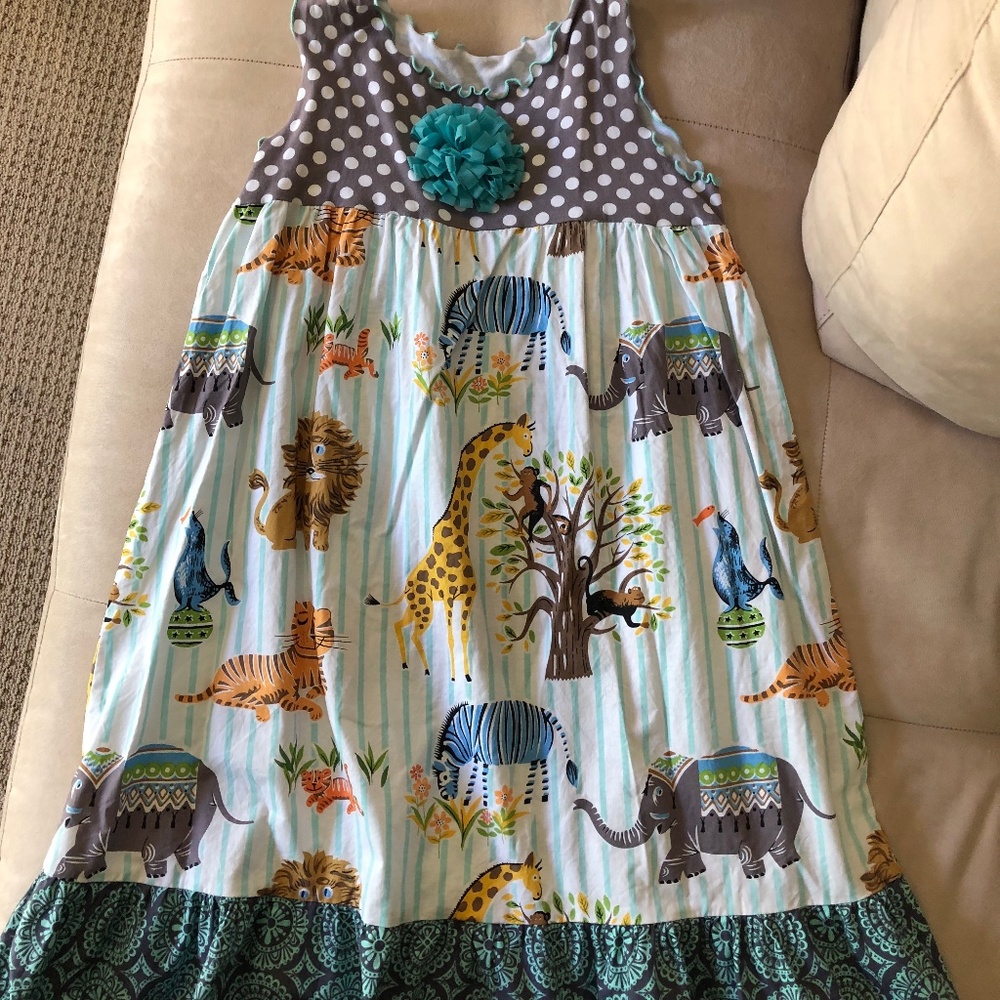 100% cotton animal dress with pom pom flower